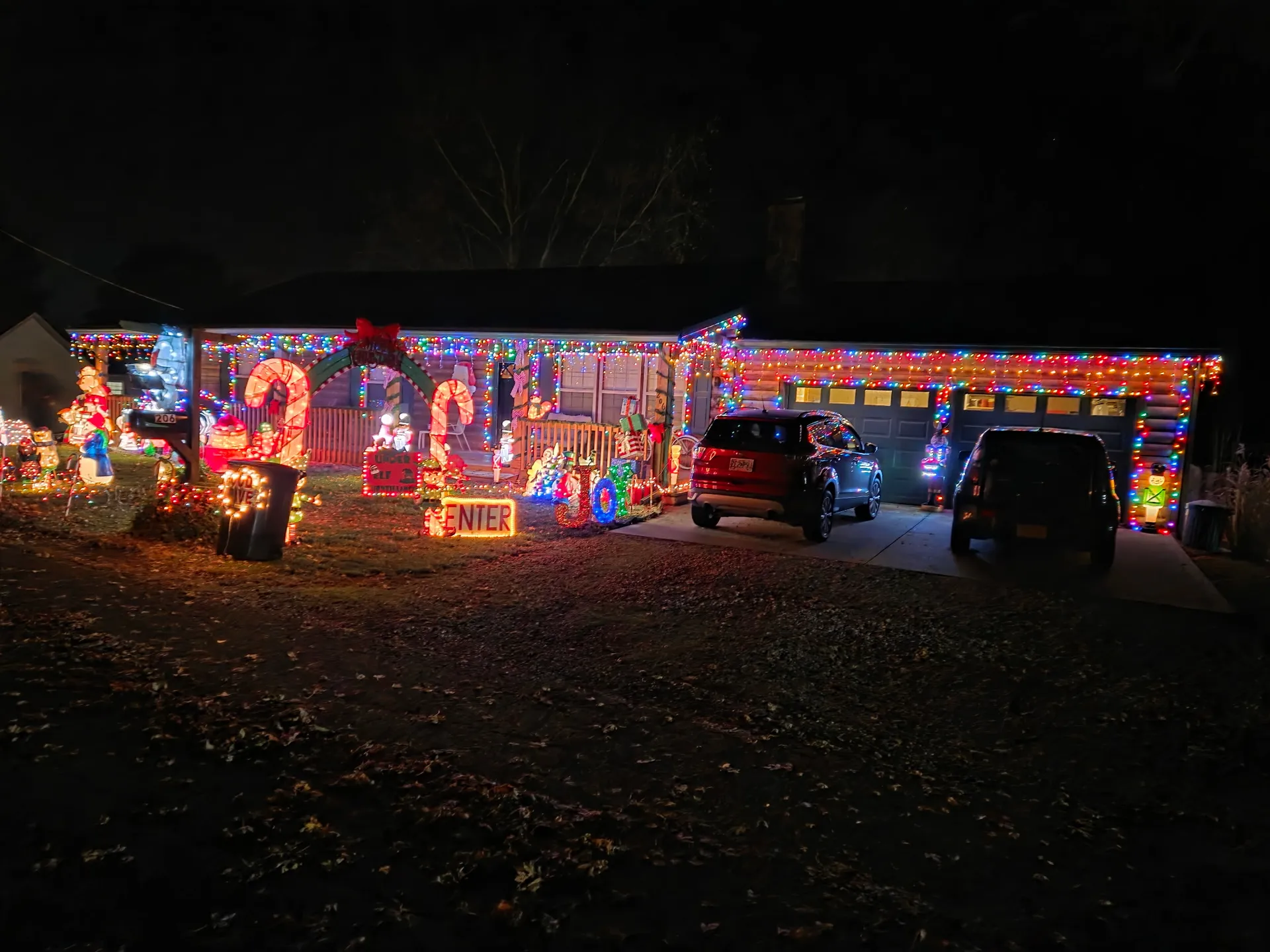 Lathrop 2025 display - house front with candy canes and blow molds